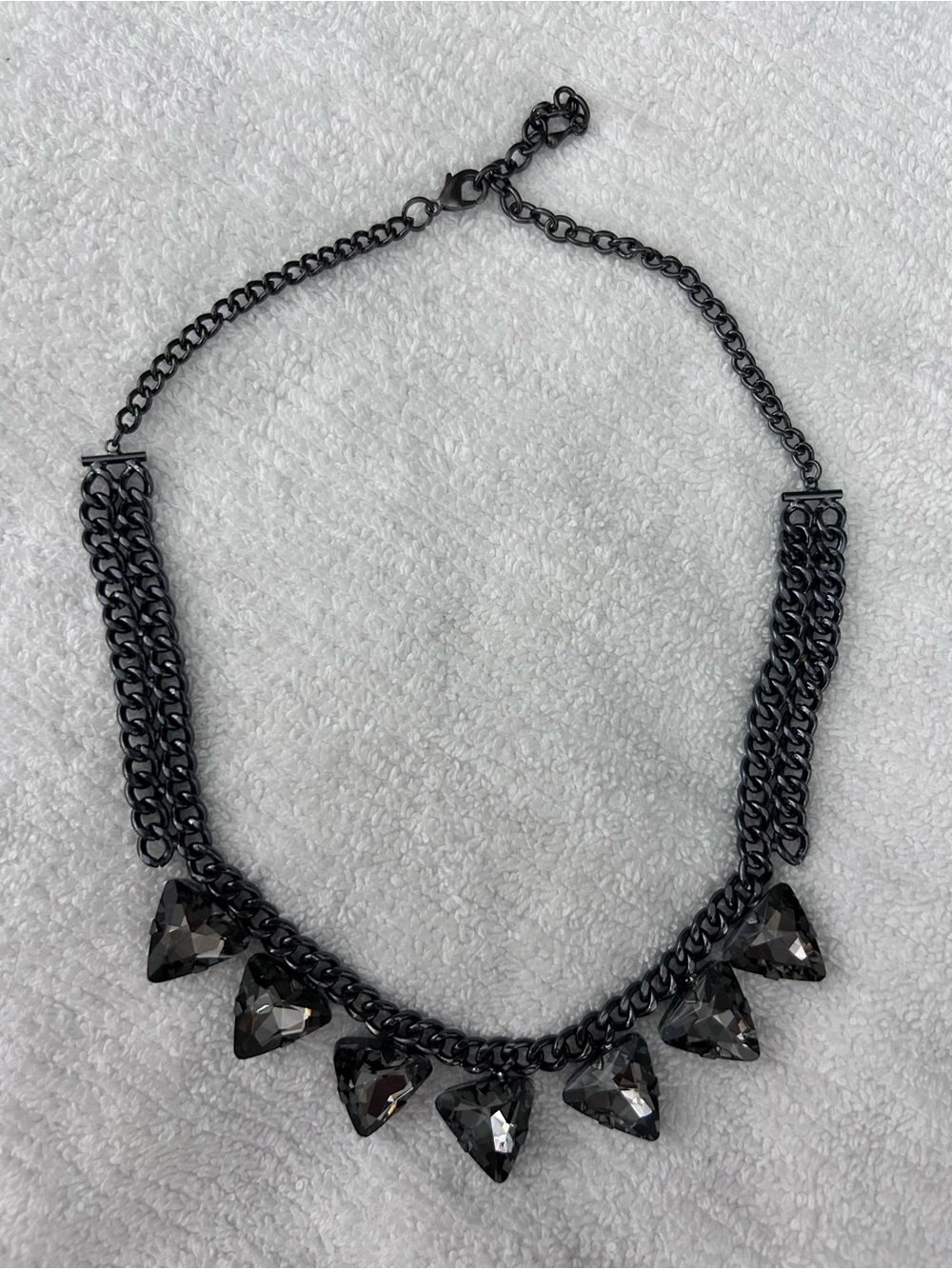 Like New gunmetal / black tone Aldo chain necklace with 7 triangle stones